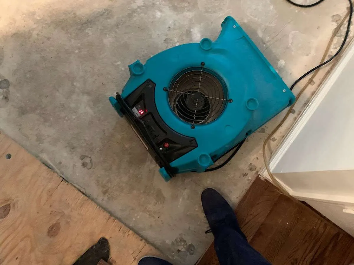 Air mover drying subfloor during Leak Detection & Repair in South Bradenton